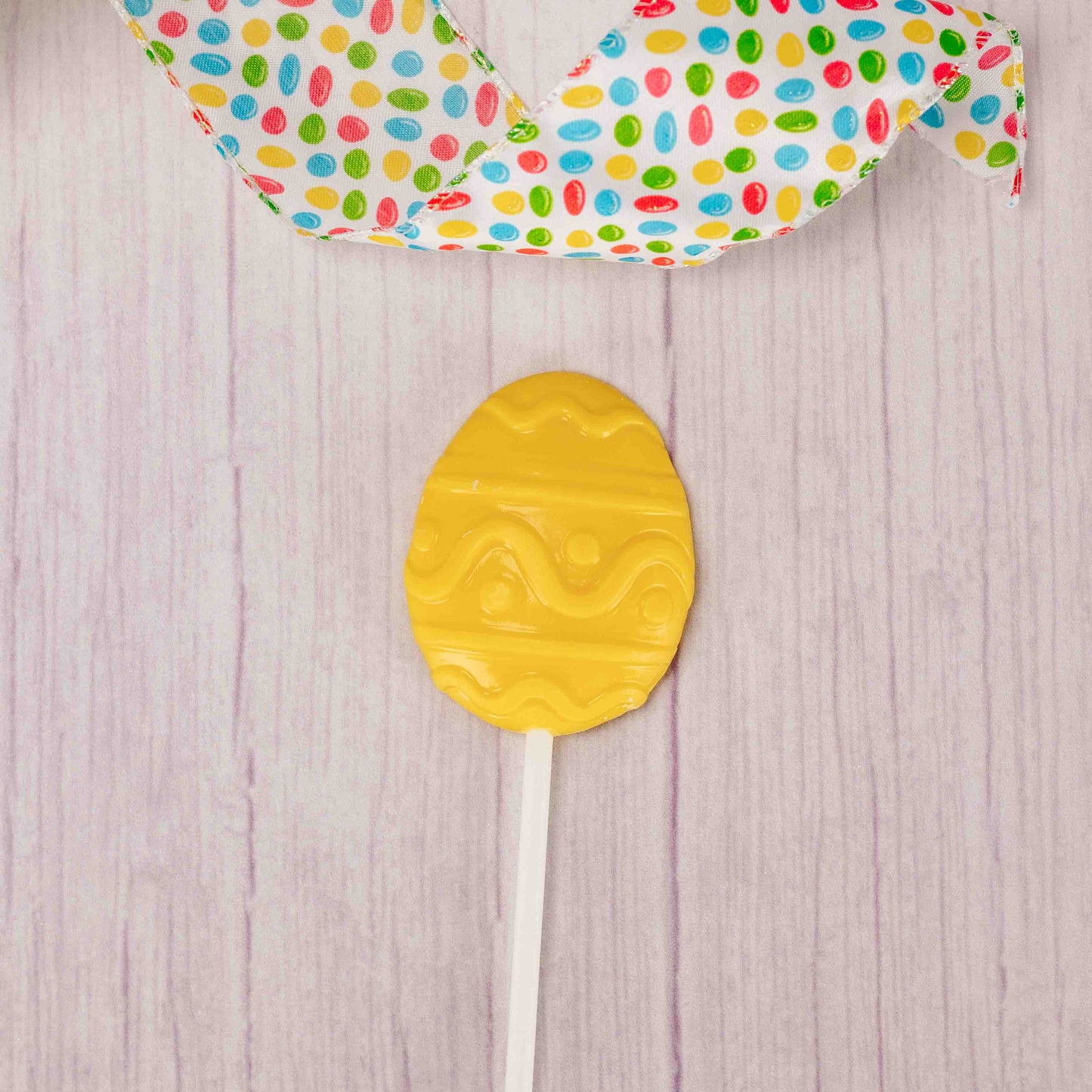 Celebrate Easter with these sweet egg suckers. They are sure to sweeten up all your baskets! White coating (tastes like white chocolate) flavor in spring colors like pink, purple, green or yellow.