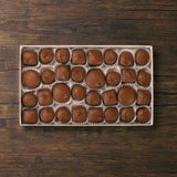 This all milk chocolate assortment contains all of your favorite soft center chocolates, including Butter Creams (vanilla), Chocolate Creams, Dutch Treats, Maple Creams, Peanut Butter Fancies, and Peppermint Patties. Approximately 32 pieces per pound.