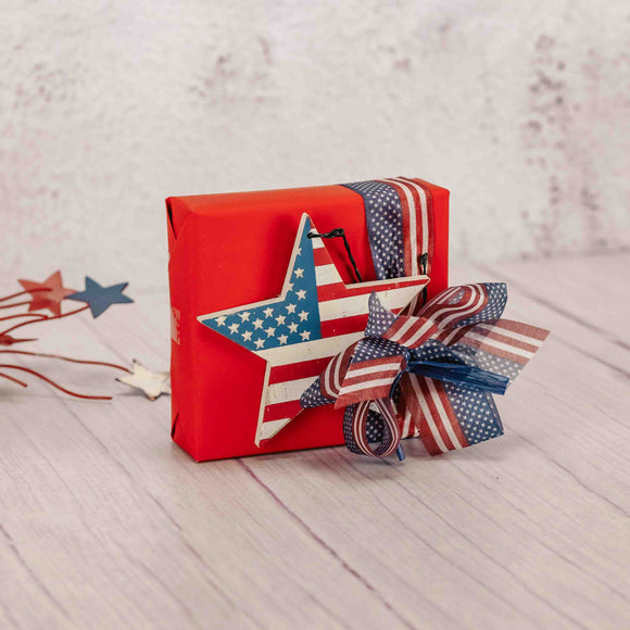 This wooden star flag ornament is carefully crafted and perfect for showing off your love for the U.S.A. Bring a little bit of Americana into your home this holiday season and a little sweetness with a sampler box of our indulgent Assorted Chocolates.
