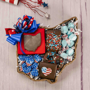 an Ohio shaped wicker basket filled with patriotic candies and chocolates