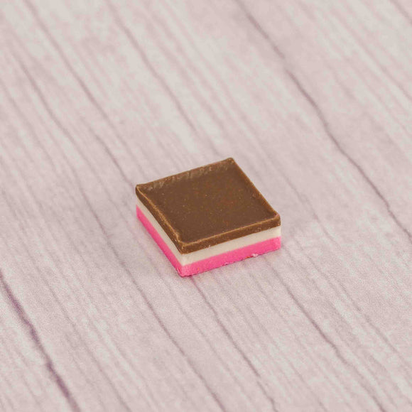 half pound sleeve of milk chocolate, white and pink wafers reflecting the flavors of Neapolitan ice cream!