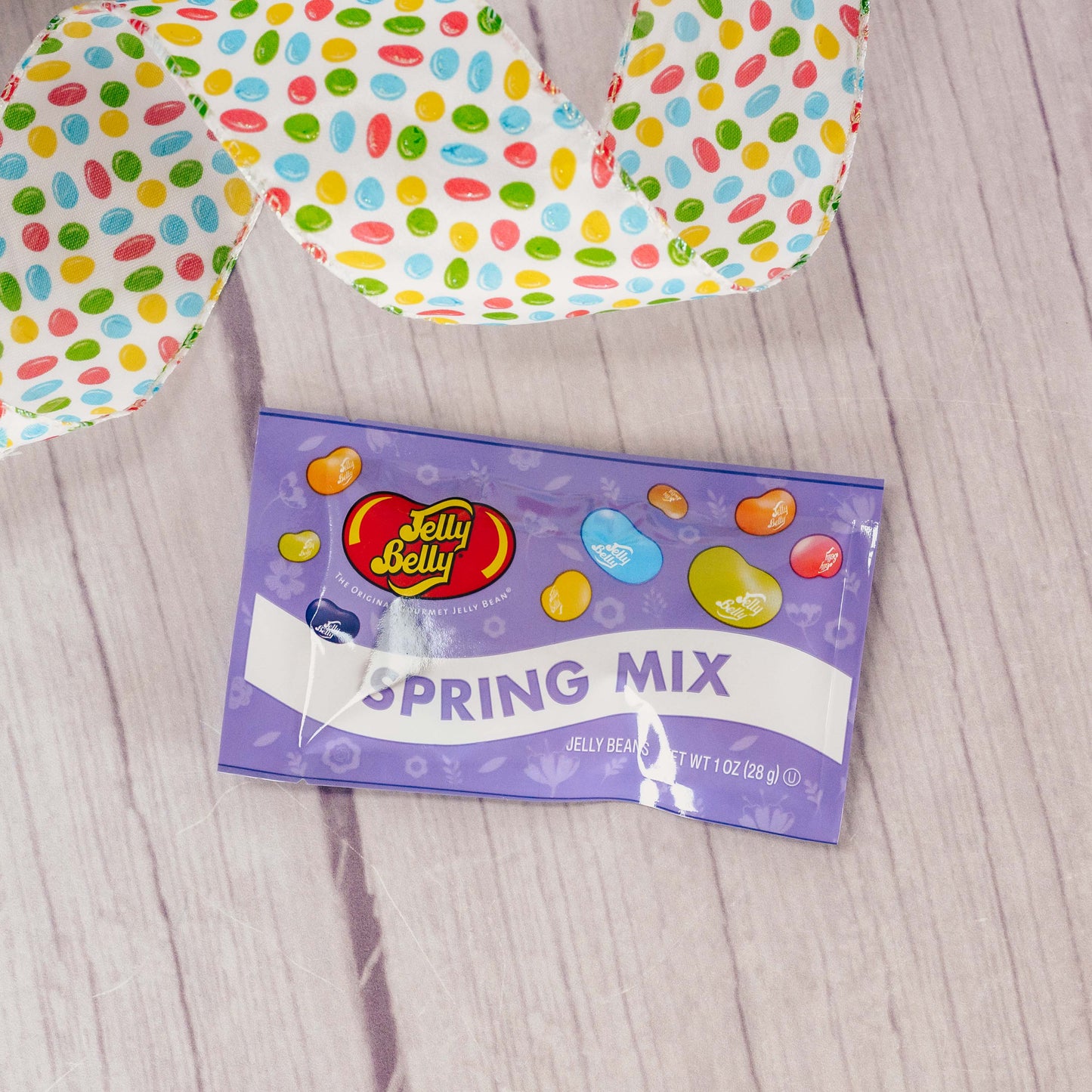 A small 1 oz. bag of spring, pastel fruit flavored Jelly Belly beans.