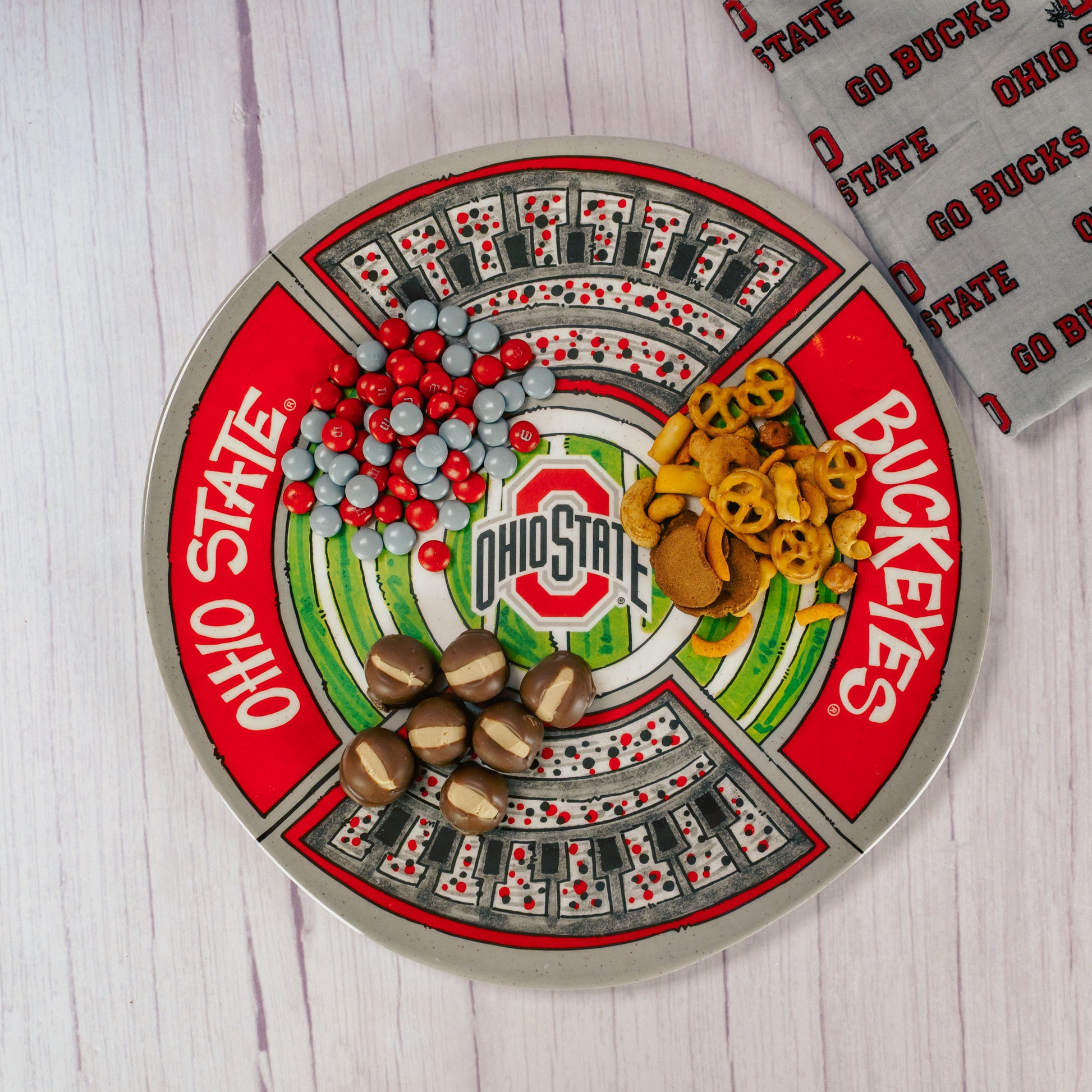 a round melamine Ohio State platter is packaged with some sweet treats!