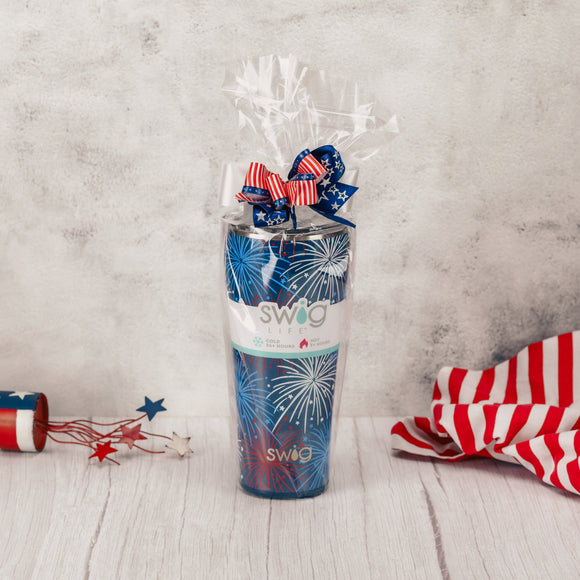 Swig Life tumbler cup with patriotic fireworks on it and filled with sweet treats
