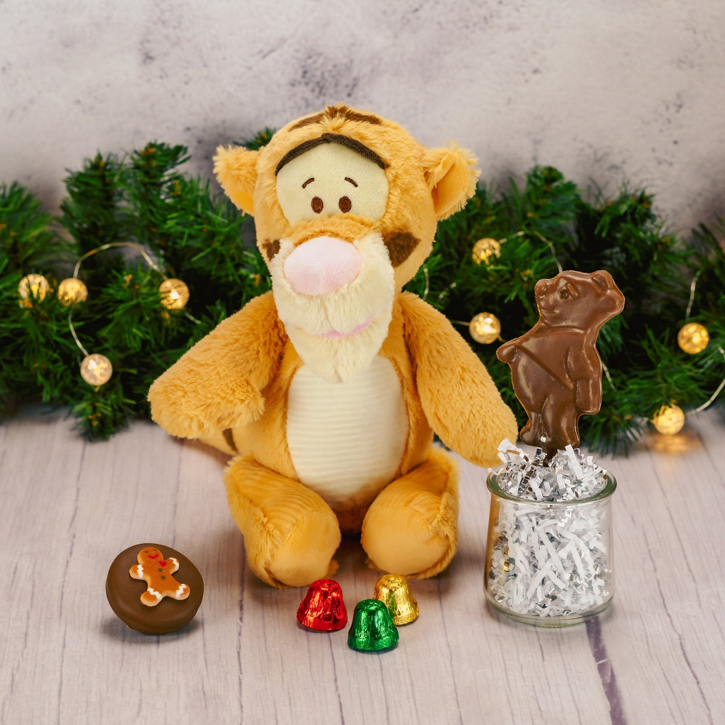 Tigger plush with a bag of sweet treats