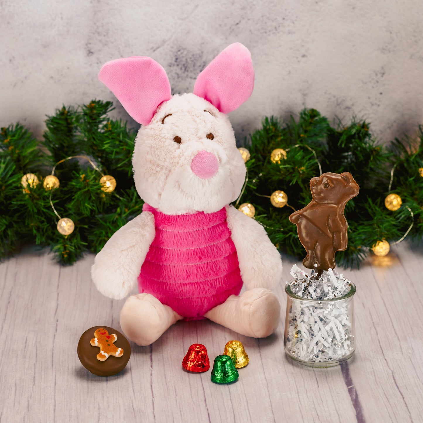 Piglet plush with a bag of sweet treats