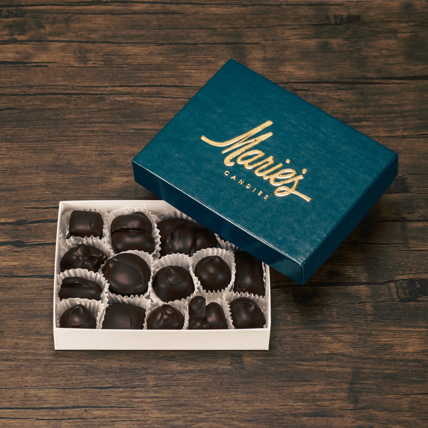 Half pound box of assorted chocolates. Choose between an all milk chocolate, milk and dark chocolate or all dark chocolate assortment. Includes a variety of creams, caramels and crunchy pieces., such as Butter Creams, Peppermint Chews, Peanut Butter and our famous Tur'Kins.