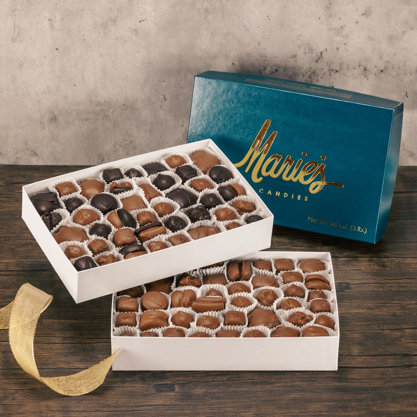 A three pound box of assorted chocolates. Choose an all milk chocolate or milk and dark chocolate assortment. Pieces include Creams, caramels and crunchy pieces., and our famous Tur'Kins, like a turtle. Approximately 90 total pieces.