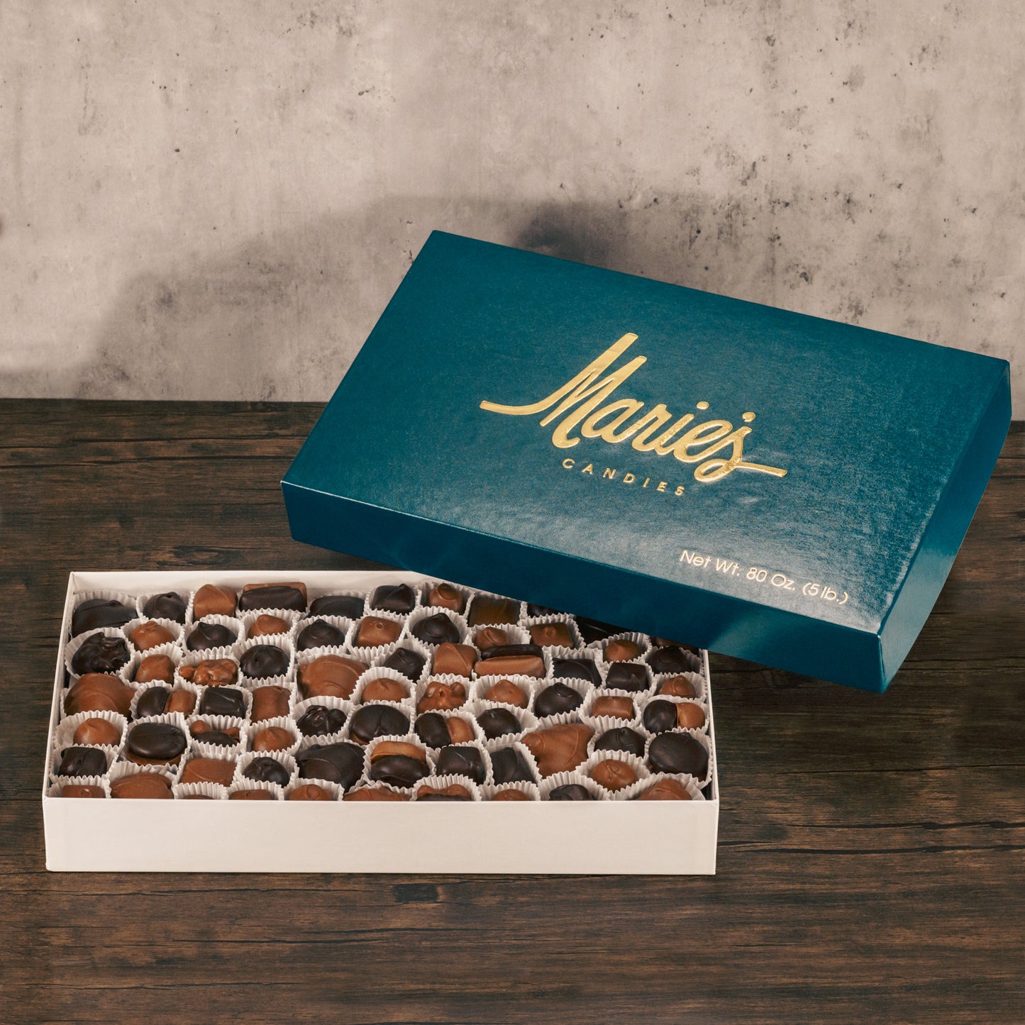 A five pound box of assorted chocolates. Choose between a milk chocolate or milk and dark chocolate assortment. Pieces include creams, caramels and crunchy pieces., and our famous Tur'Kins, like a turtle. Approximately 150 pieces.