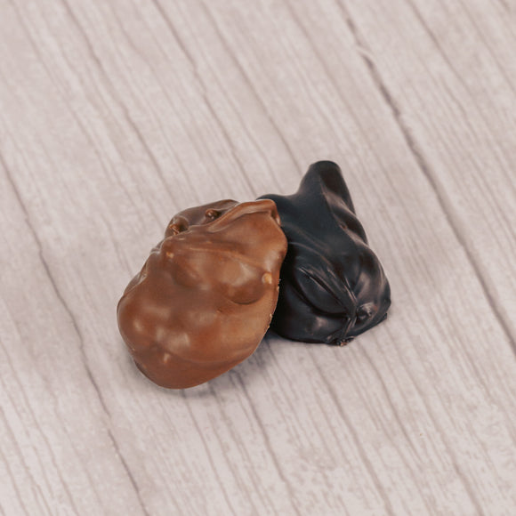 a one pound box of peanuts dipped in milk or dark chocolate.