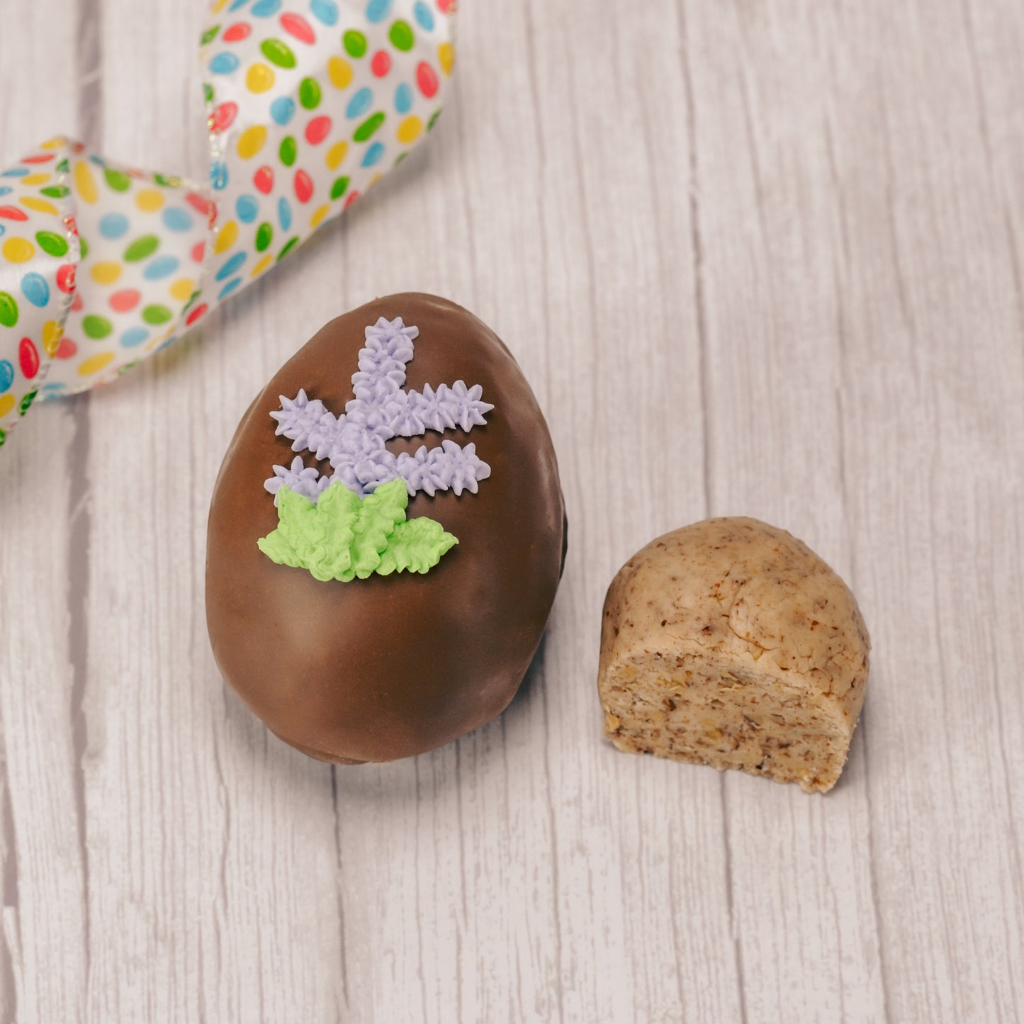 pecan cream eggs in milk chocolate or pink coating in various sizes
