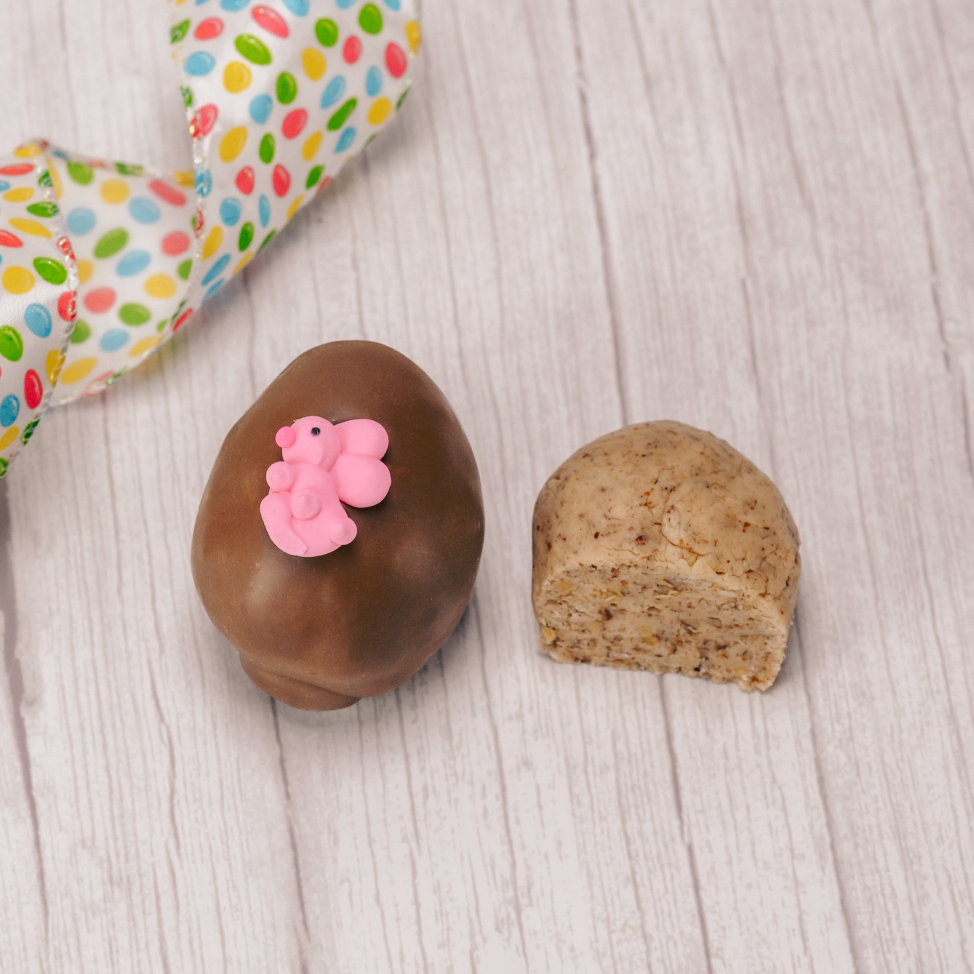 pecan cream eggs in milk chocolate or pink coating in various sizes