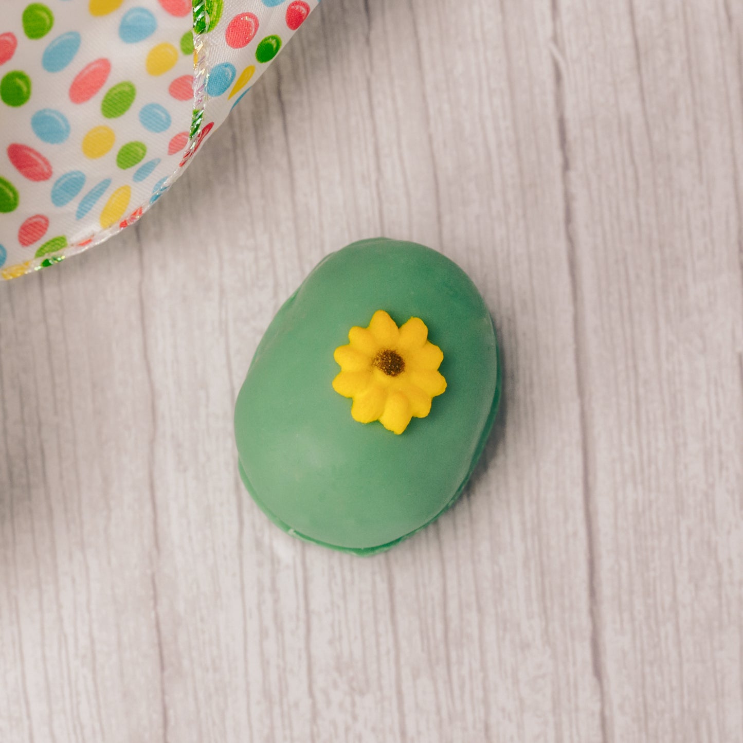 A smaller version of your favorite flavored cream eggs, all hand decorated with assorted Easter icing decorations. Each color egg is a different flavor. Choose from Yellow Coconut Cream, Pink Pecan Cream, Milk Chocolate Chocolate Cream, Green Vanilla Cream or White Peanut Butter Cream.