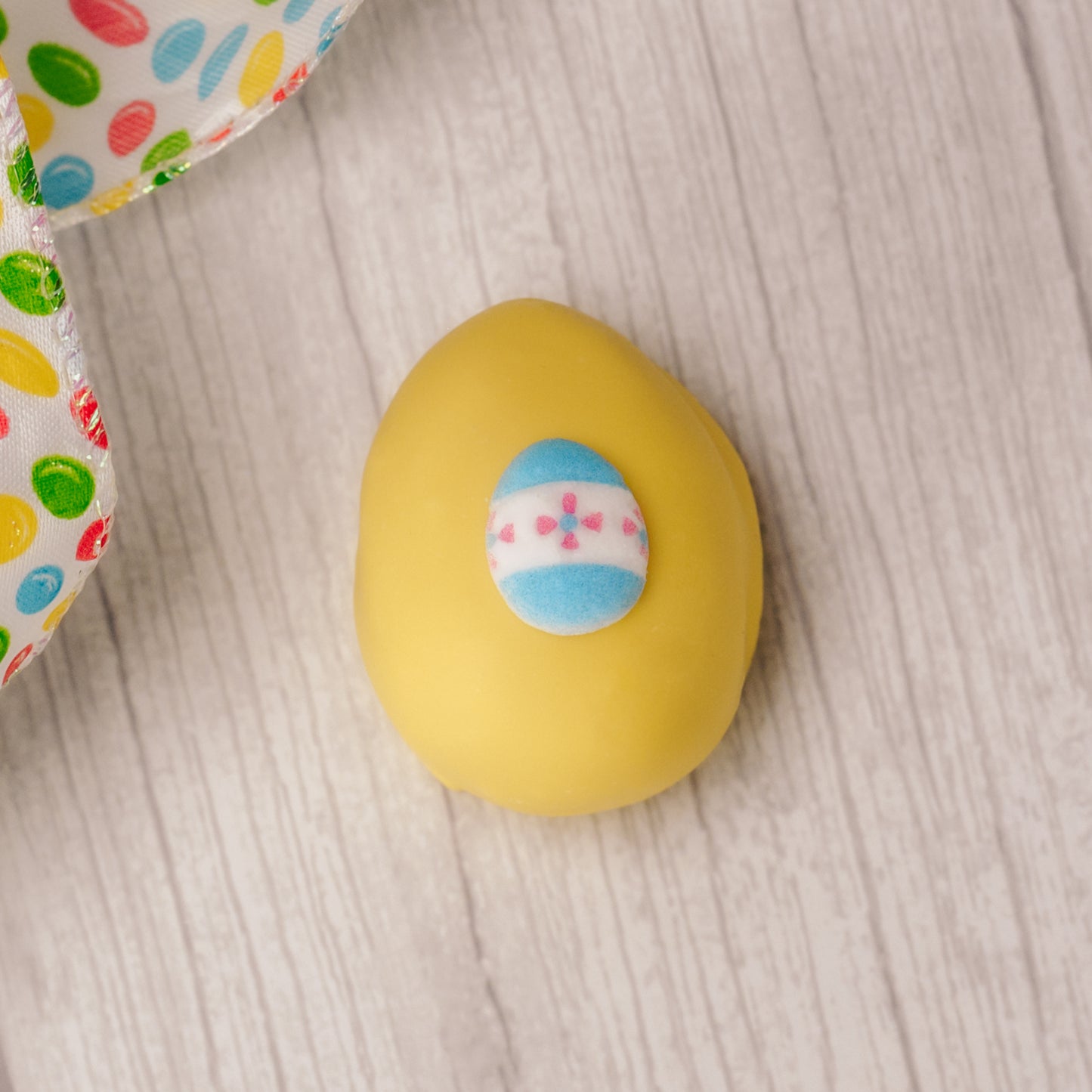 A smaller version of your favorite flavored cream eggs, all hand decorated with assorted Easter icing decorations. Each color egg is a different flavor. Choose from Yellow Coconut Cream, Pink Pecan Cream, Milk Chocolate Chocolate Cream, Green Vanilla Cream or White Peanut Butter Cream.