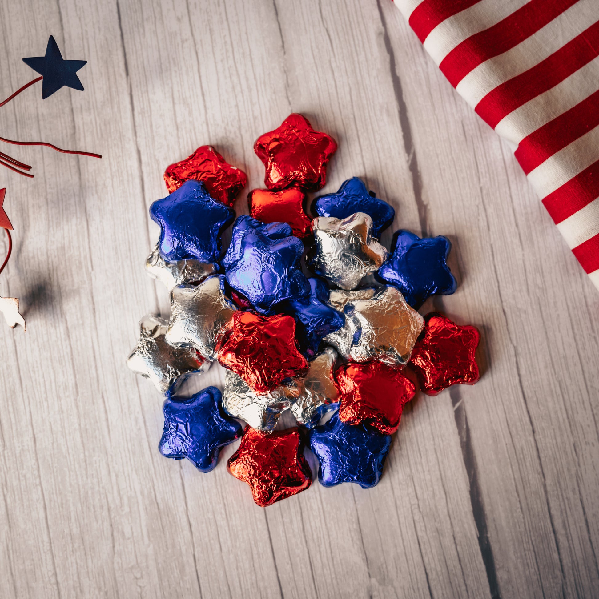 half pound bag of red, blue and silver foil-wrapped milk chocolate stars.