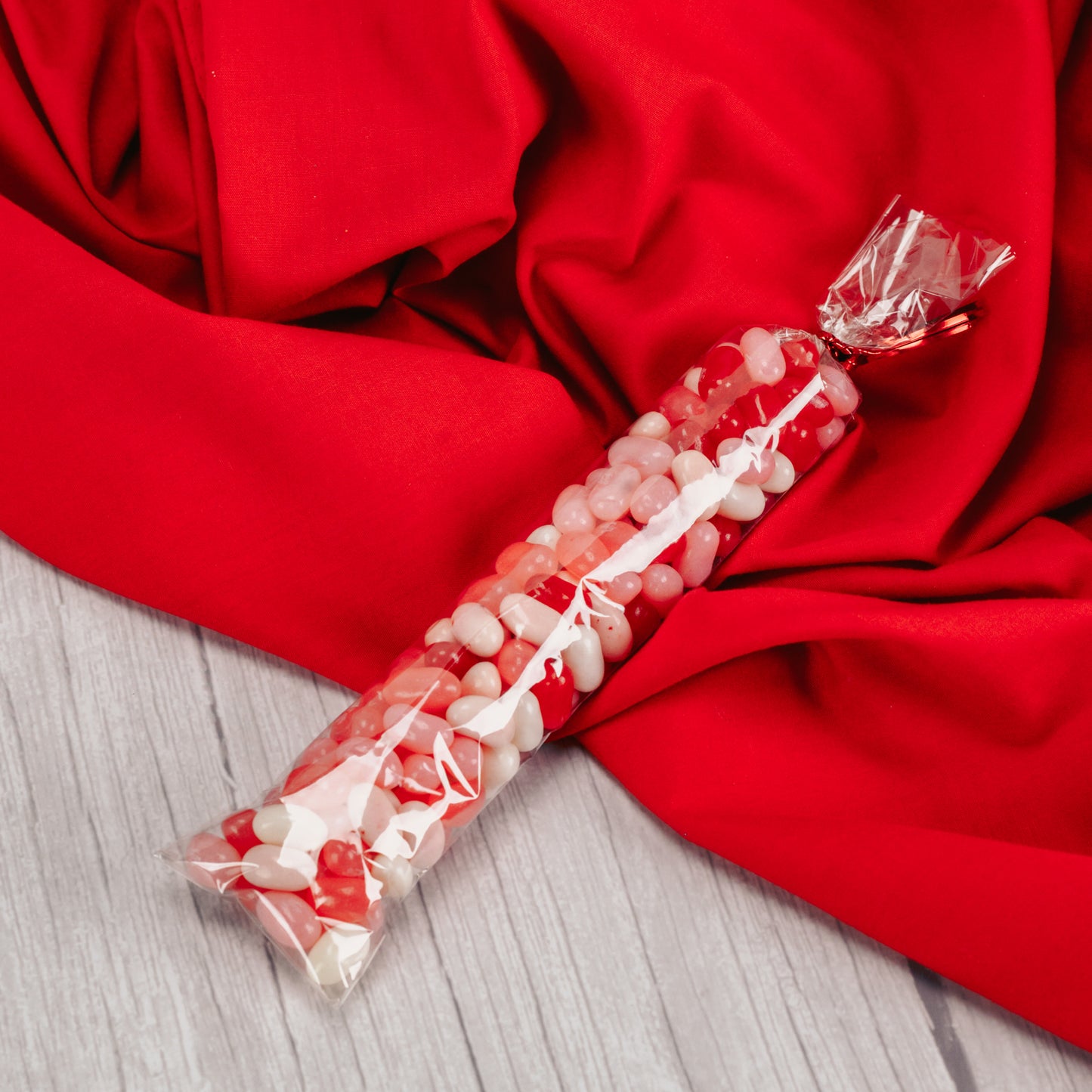 five ounces of Jelly Belly jelly beans festive for Valentine's Day in red, pink and white colors.