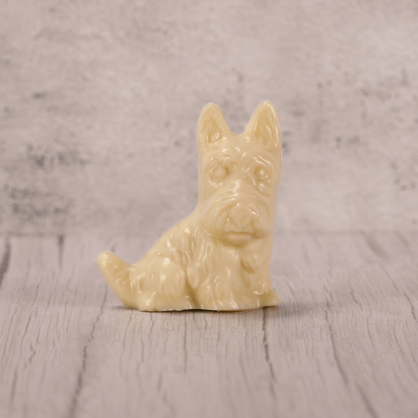 A scottie dog in white coating (tastes like white chocolate).