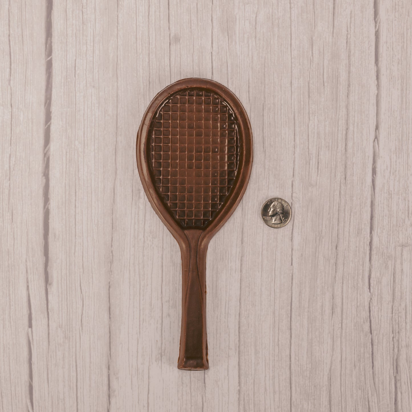 milk chocolate tennis racquet in a box.