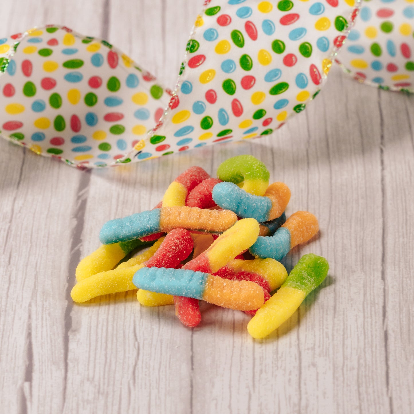 Choose sour jelly eggs, sour neon worms or gummi bears. 3 ounces of each in a bag - perfect for baskets!