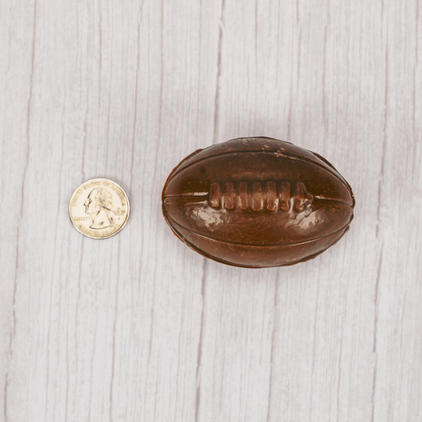 Milk chocolate, solid football.