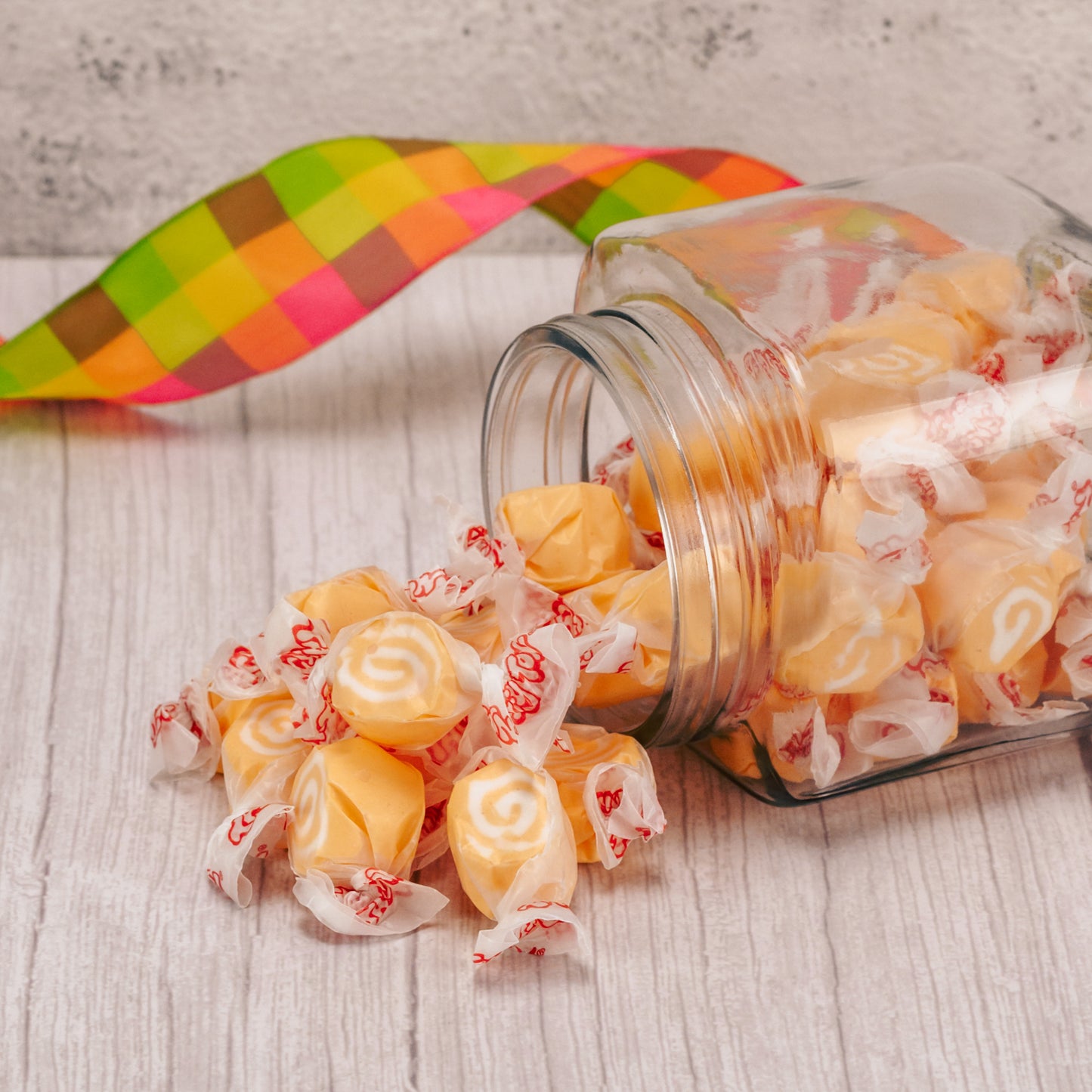 a half pound bag of orange taffy.