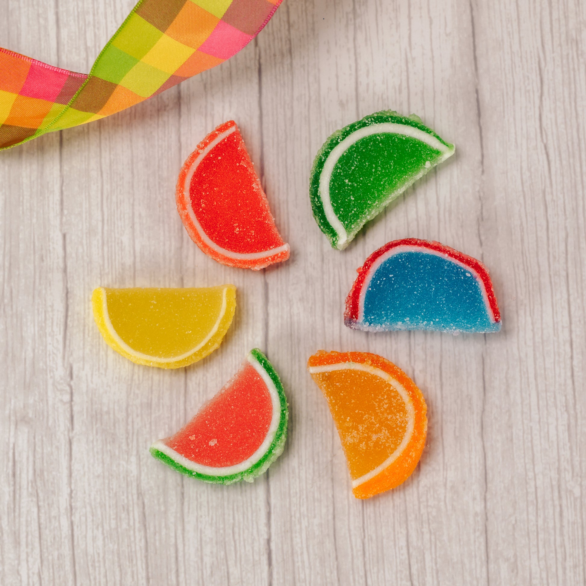 chewy, gummi sugar-coated fruit slices include blue raspberry, lemon, lime, orange, cherry and watermelon. Come two of each flavor in a package.