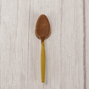 A plastic spoon dipped in milk chocolate, dark chocolate or white coating. Individually wrapped..