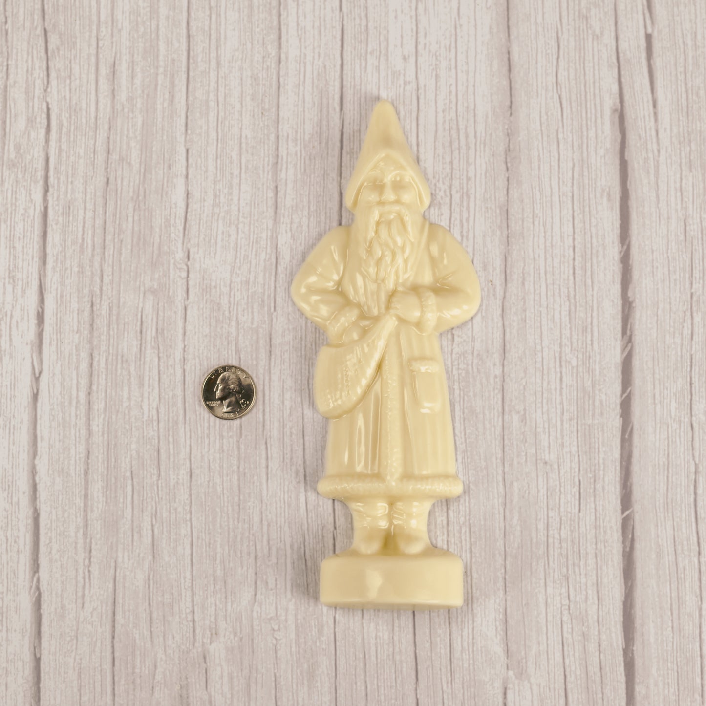 a tall St. Nick in white coating.