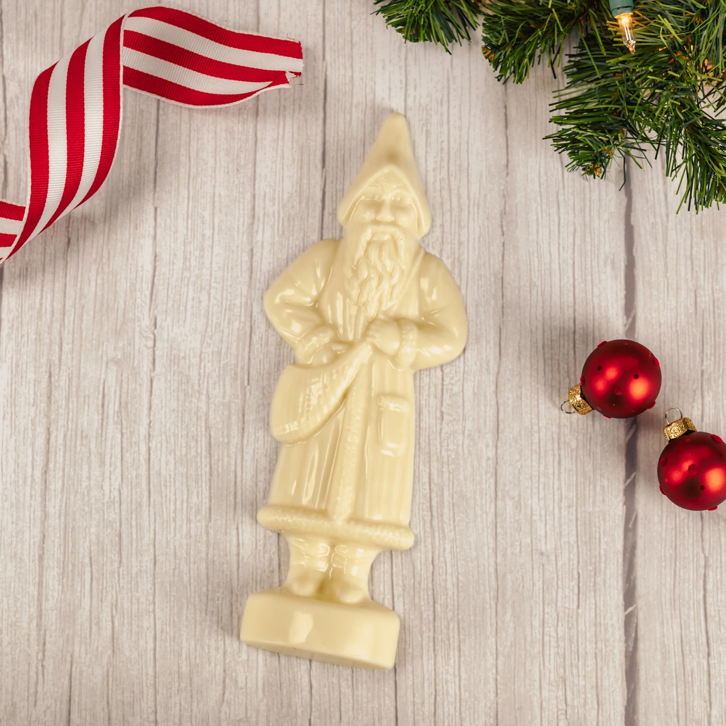 a tall St. Nick in white coating.