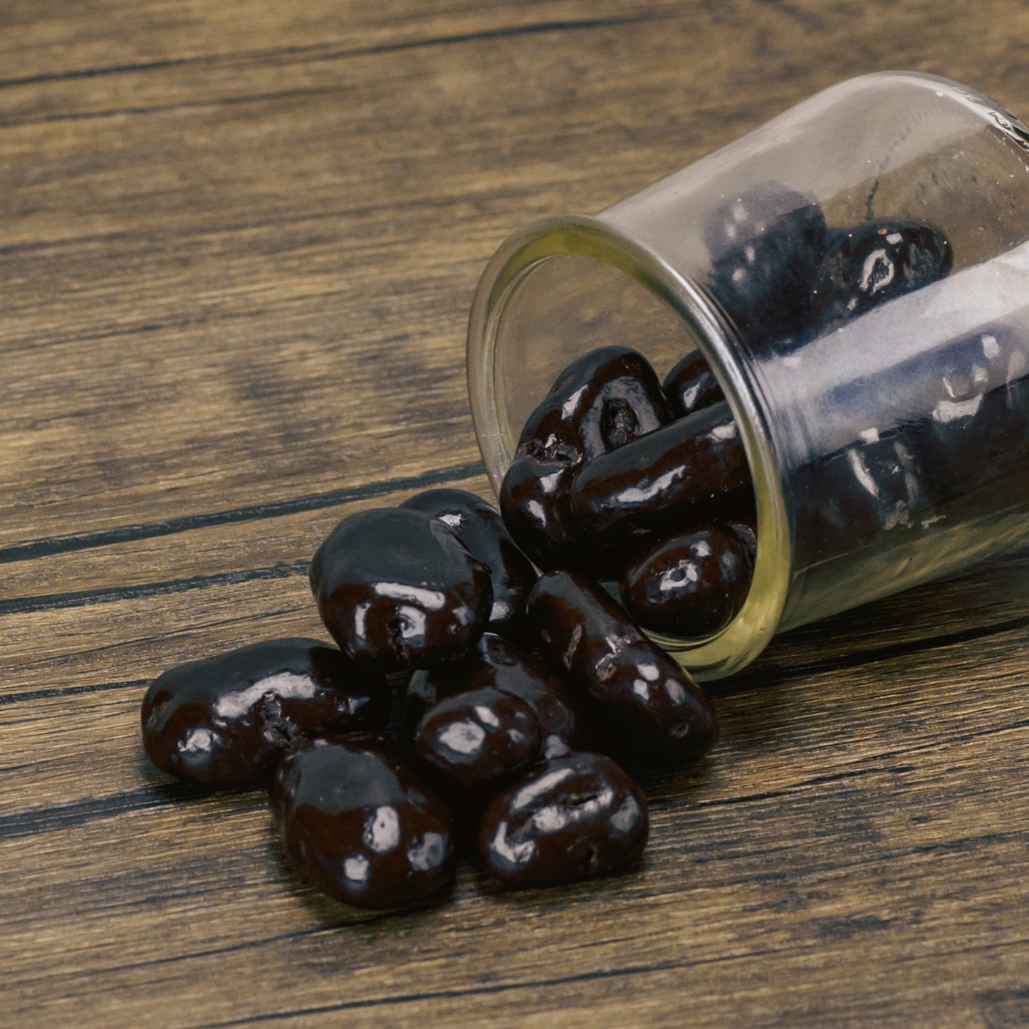 dark chocolate covered pecans with a slight amaretto flavor. In half pound bags