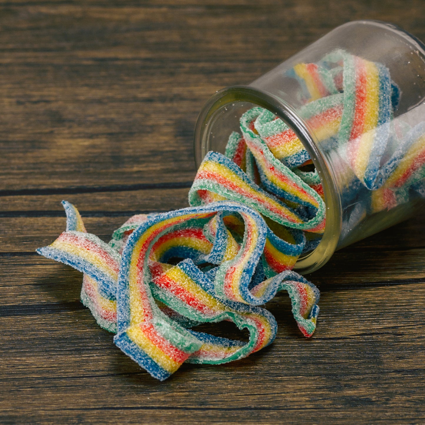 long rainbow quattro sour belts in half pound bagsTreat your mouth with pink lemonade or quattro rainbow sour belts that are soft and chewy. Each belt is approximately 10 inches long and there are about 28 pieces in a half pound bag. Your mouth will be watering for more!