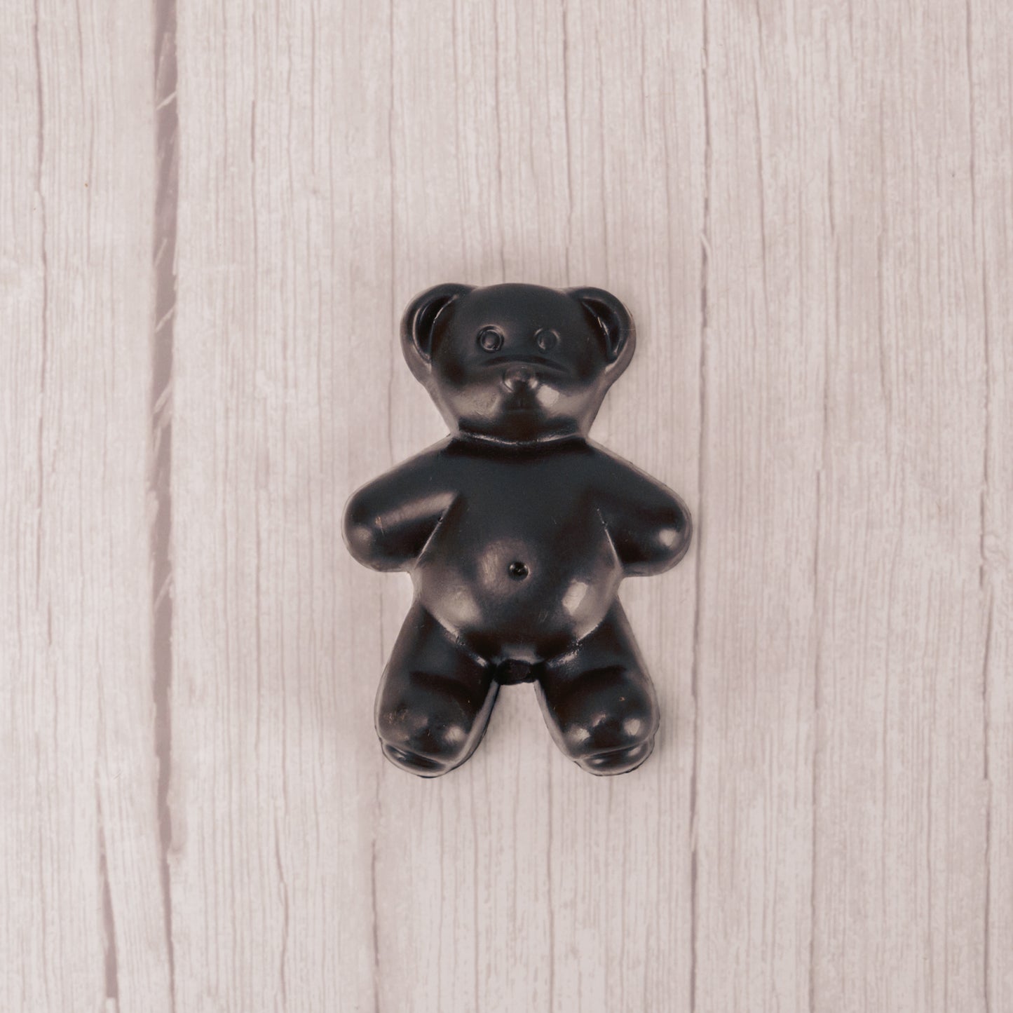 Solid dark chocolate teddy bear.