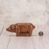 a milk chocolate solid pig