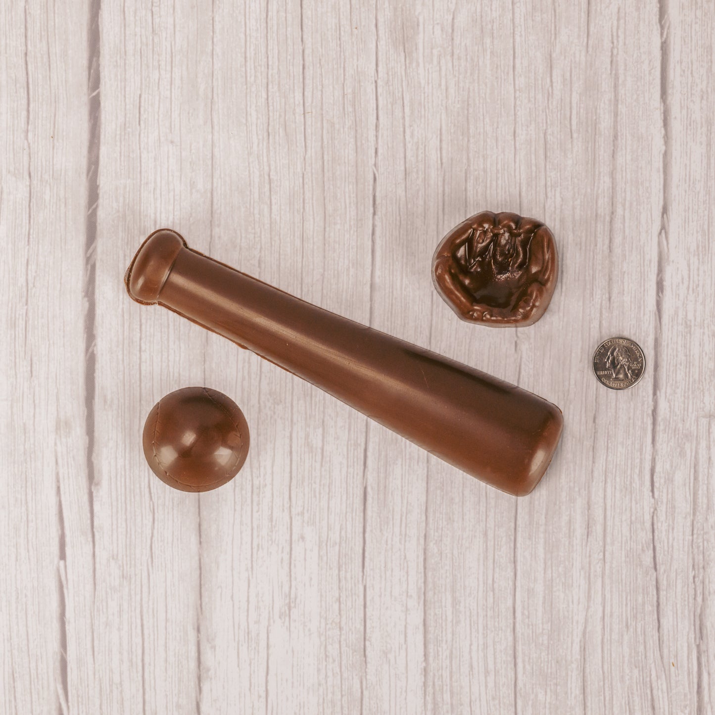 Solid chocolate. Baseball, baseball bat and baseball glove. packaged in a box