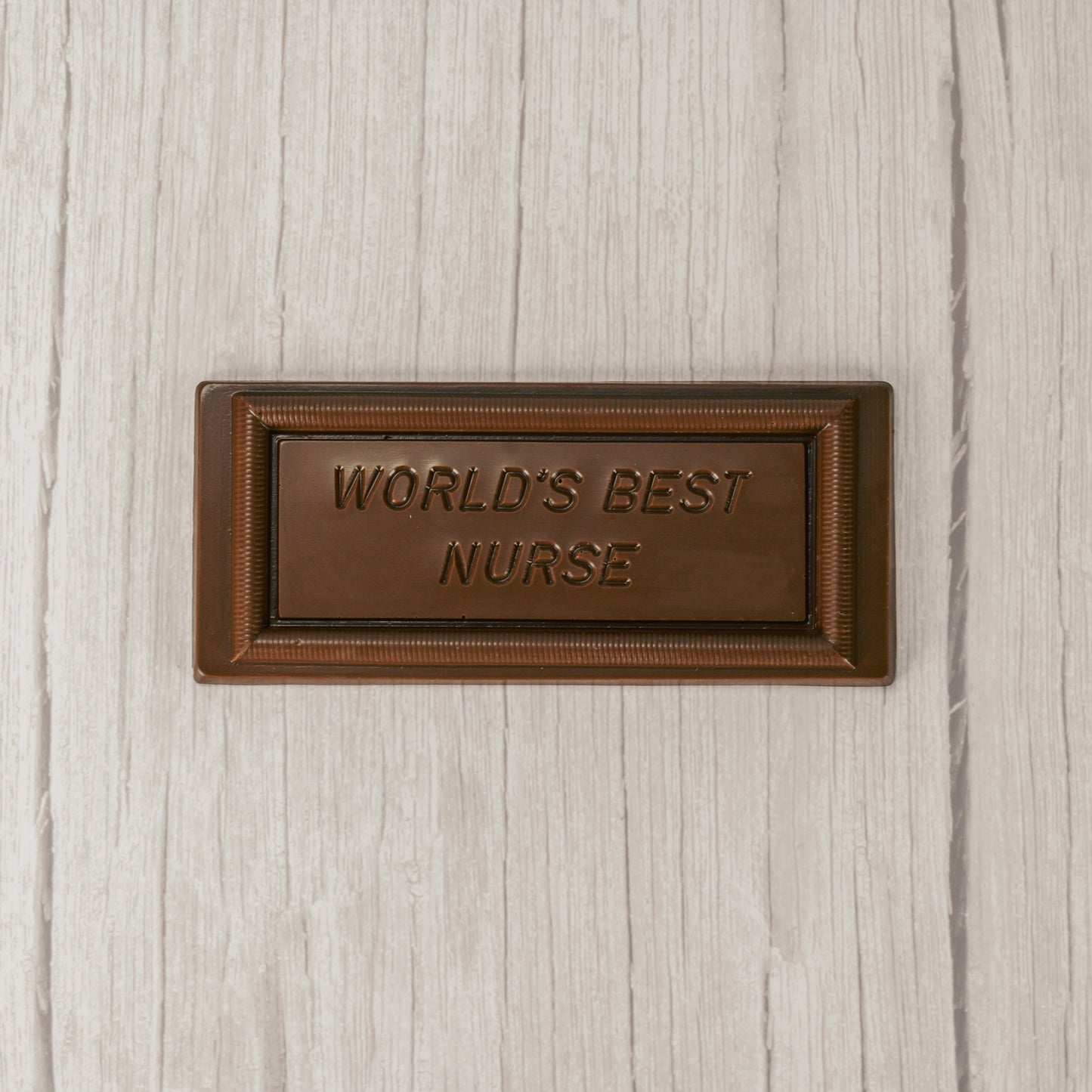solid milk chocolate rectangle bar that reads "World's Best Nurse"