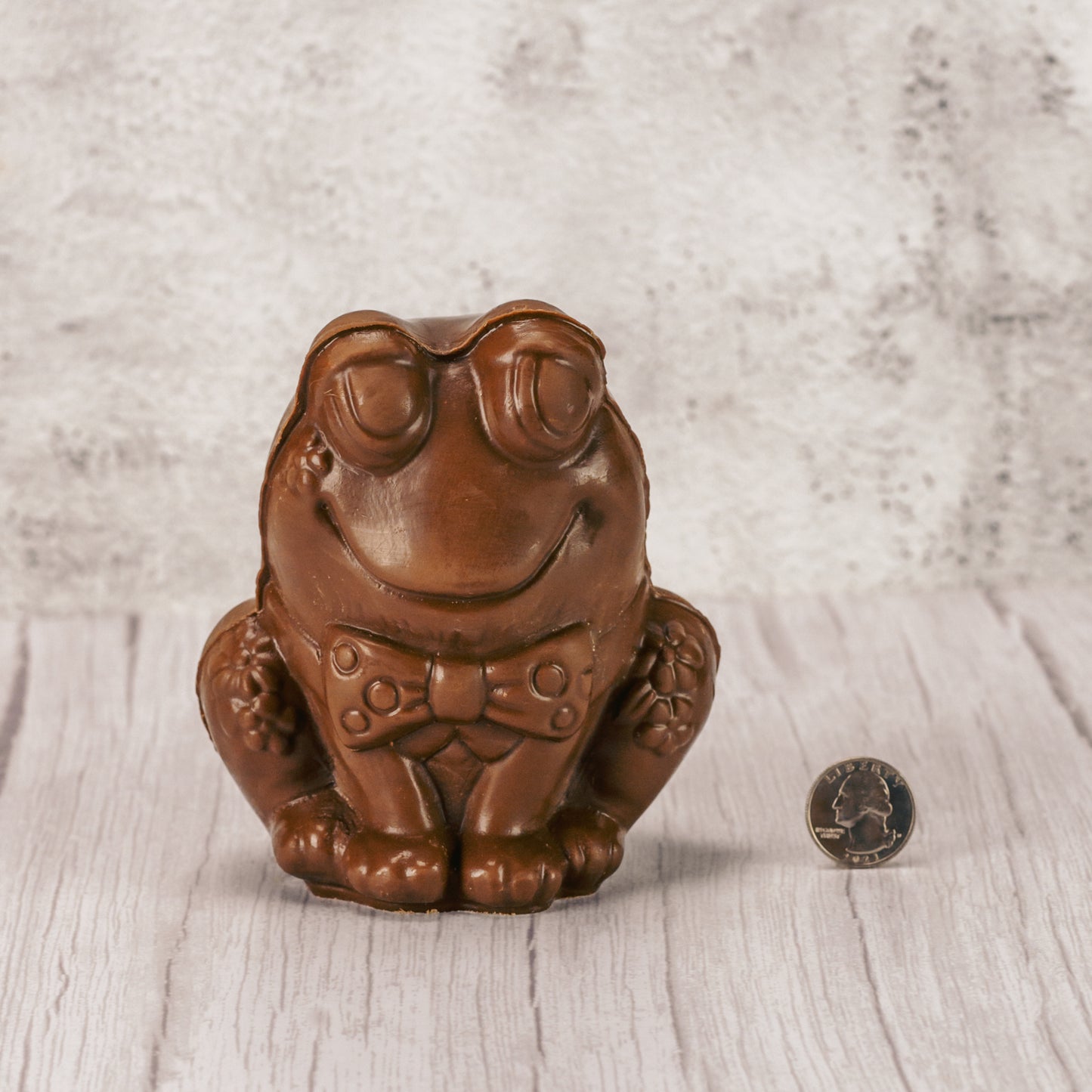 Almost two pounds of smooth milk chocolate! An adorable large-eyed frog is smiling and waiting to be taken home with you.