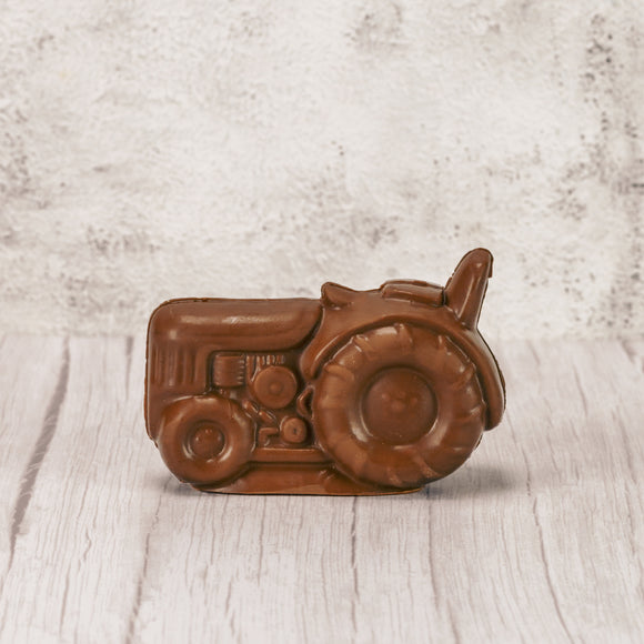 Over a pound of smooth milk chocolate is made into a large tractor, ready to work in your fields and gardens!