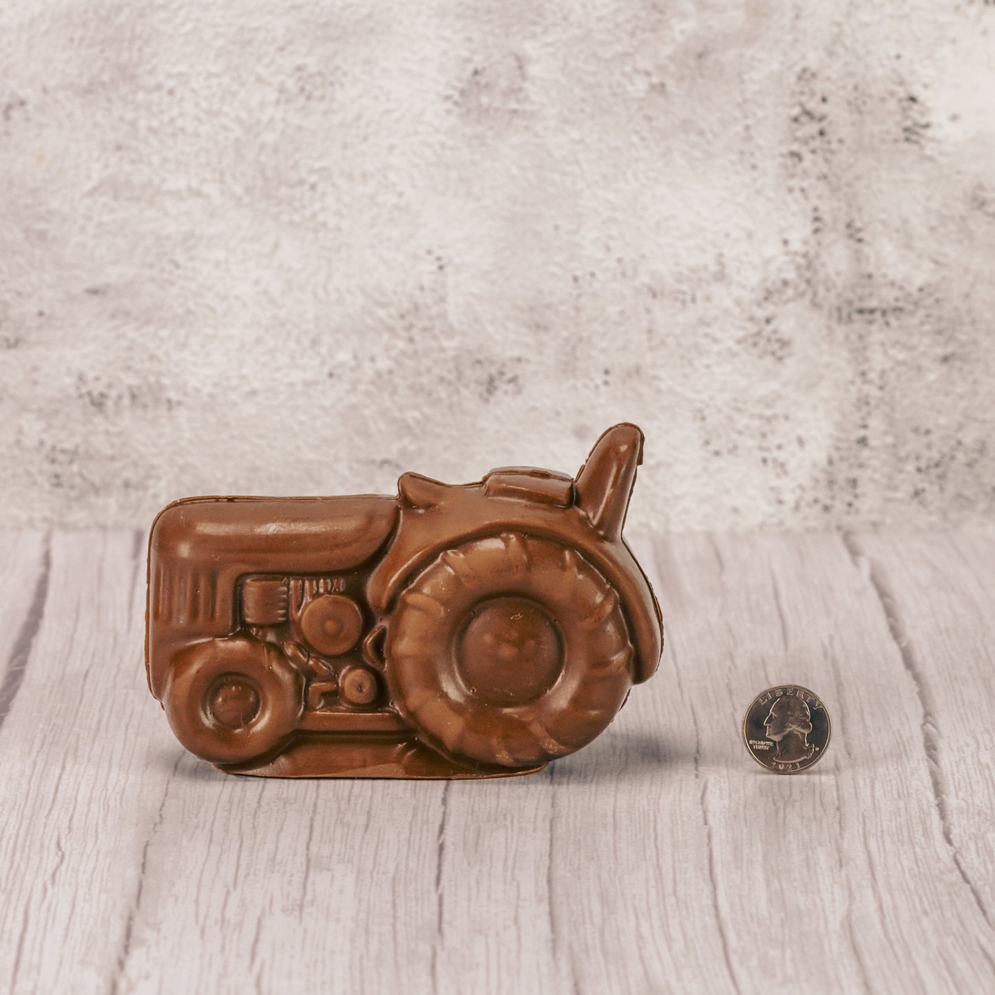 Over a pound of smooth milk chocolate is made into a large tractor, ready to work in your fields and gardens!