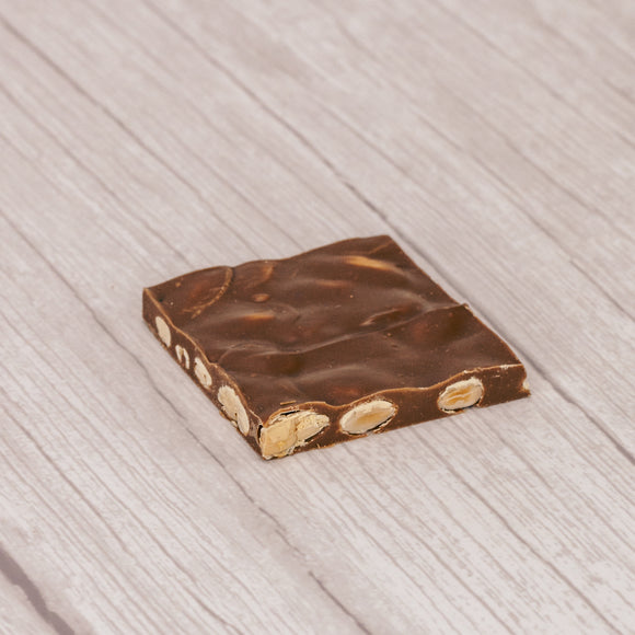 Milk chocolate with almonds. Cut into 2 inch by 2 inch squares. Approximately 16 pieces in a  pound box.