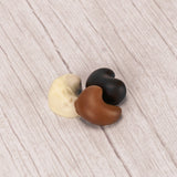 freshly roasted cashews covered in smooth milk chocolate, rich dark chocolate or sweet white coating (tastes like white chocolate) in a pound box.