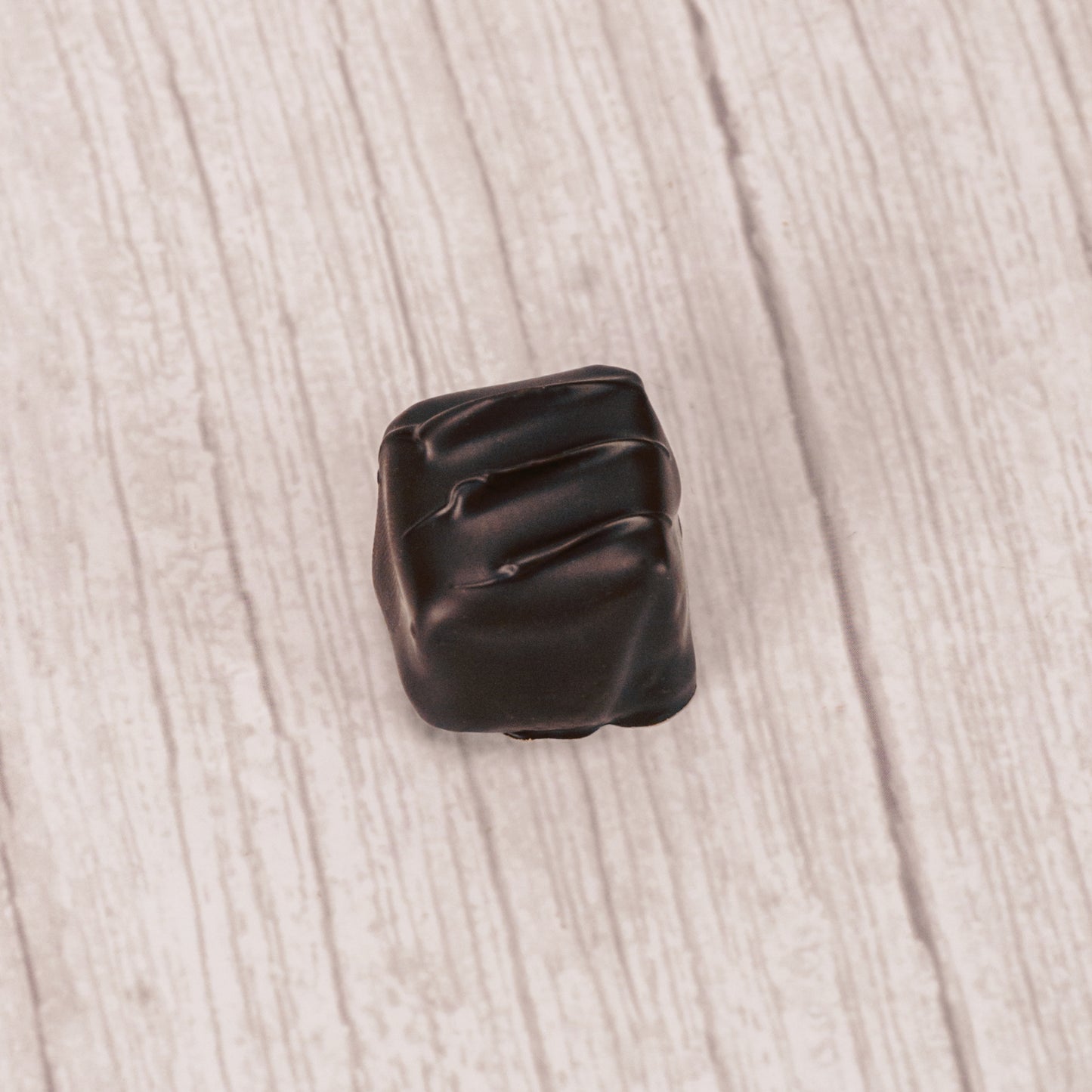 smooth chocolate mint center covered in rich dark chocolate in a pound box.