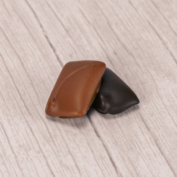 a crunchy honeycomb center dipped in rich dark chocolate or smooth milk chocolate in a pound box.