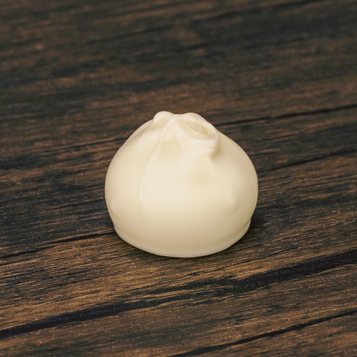 lime flavored cream center covered in white coating in a pound box. Available during the summer
