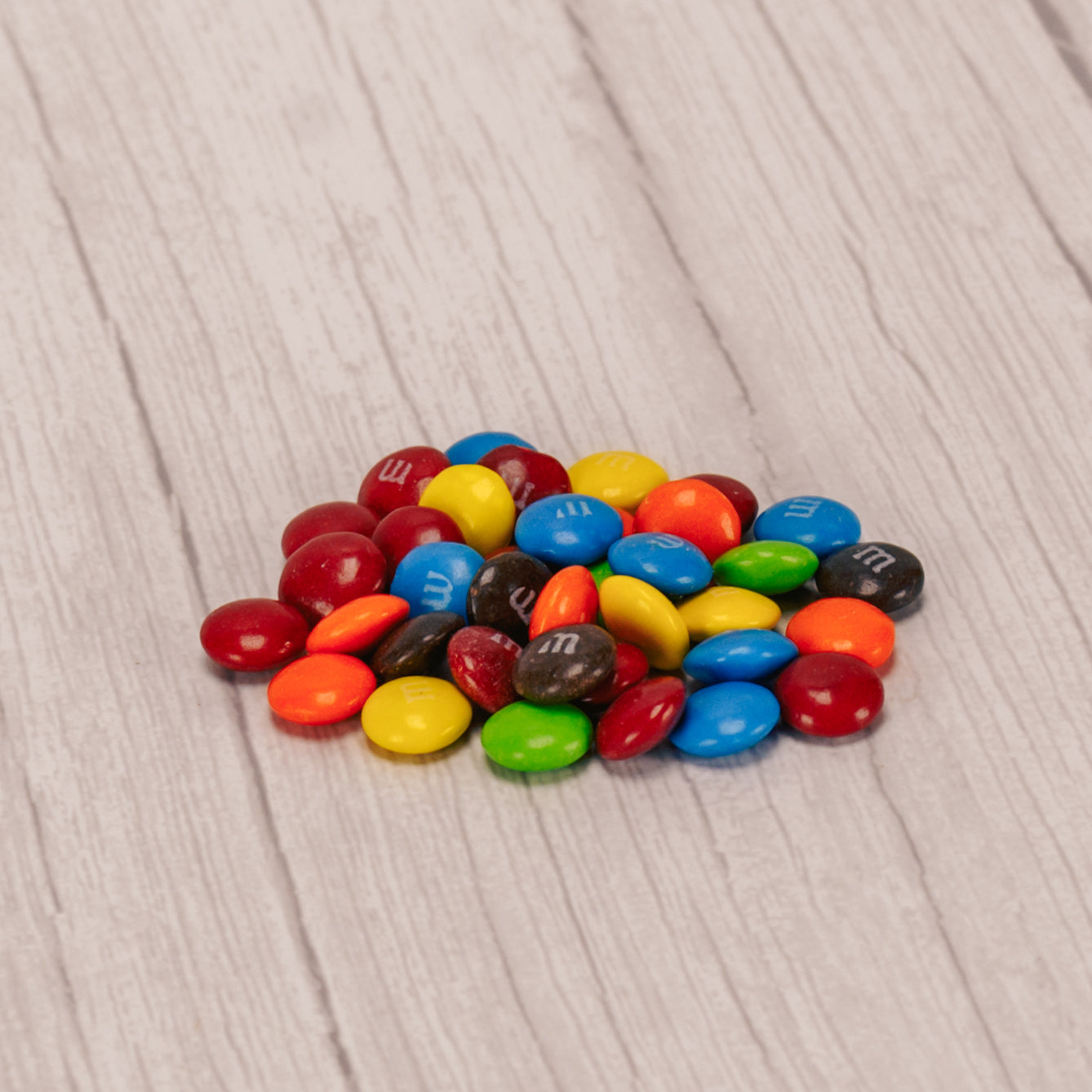 a one ounce bag of classic M&Ms.