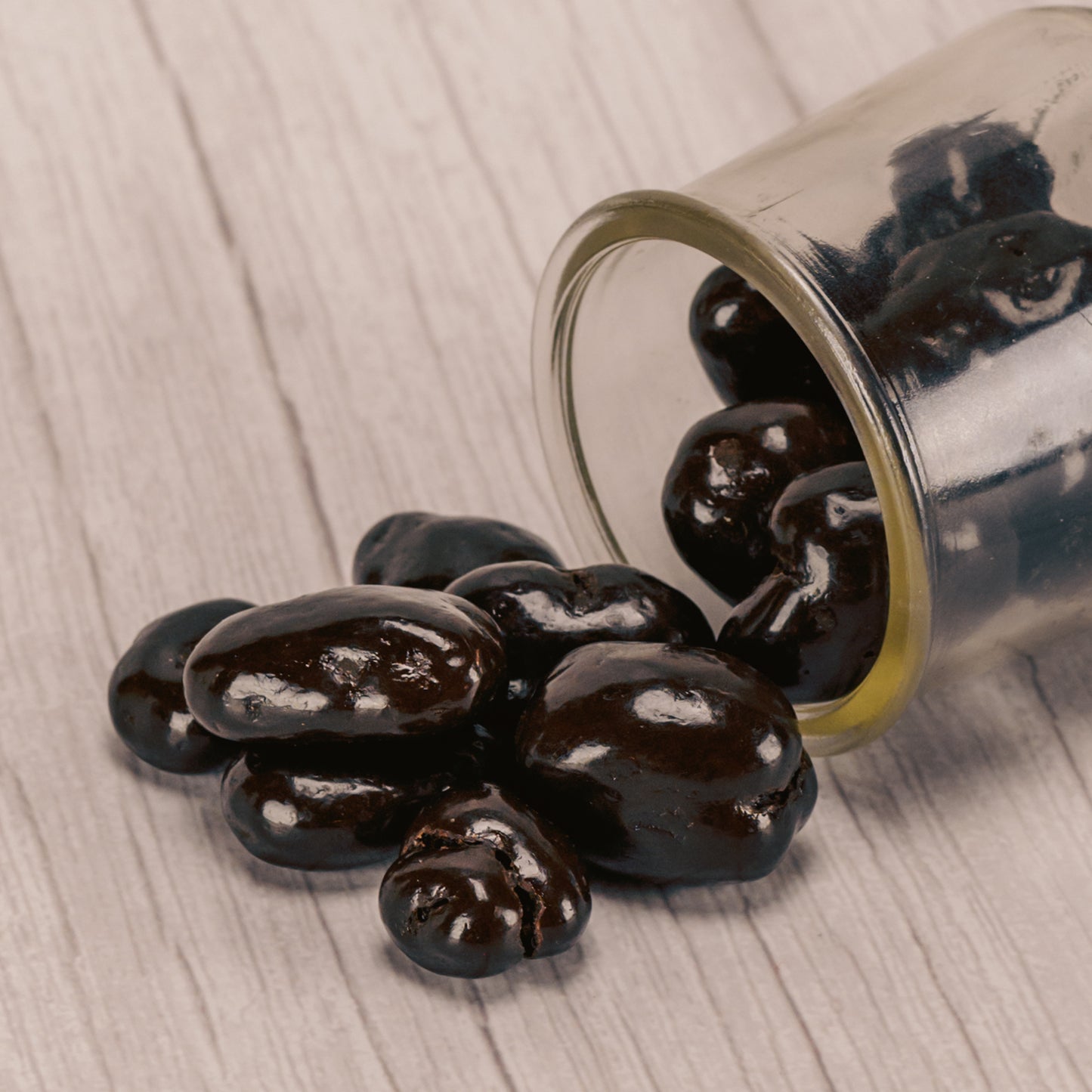 dark chocolate covered pecans with a slight amaretto flavor. In half pound bags