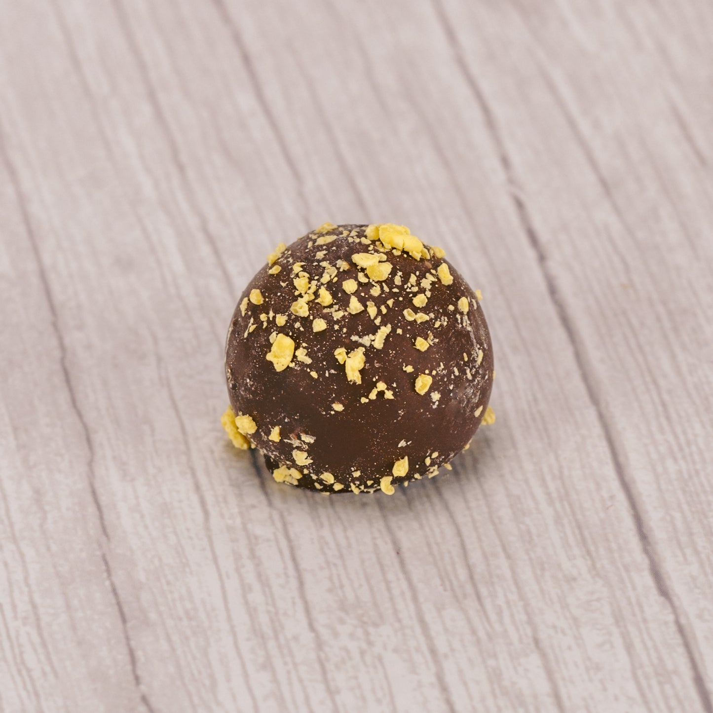 milk lemon truffle with yellow sprinkles on top