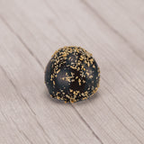 A flavor infusion of ripe coconut and dark chocolate ganache, hand decorated with toasted coconut macaroon. 