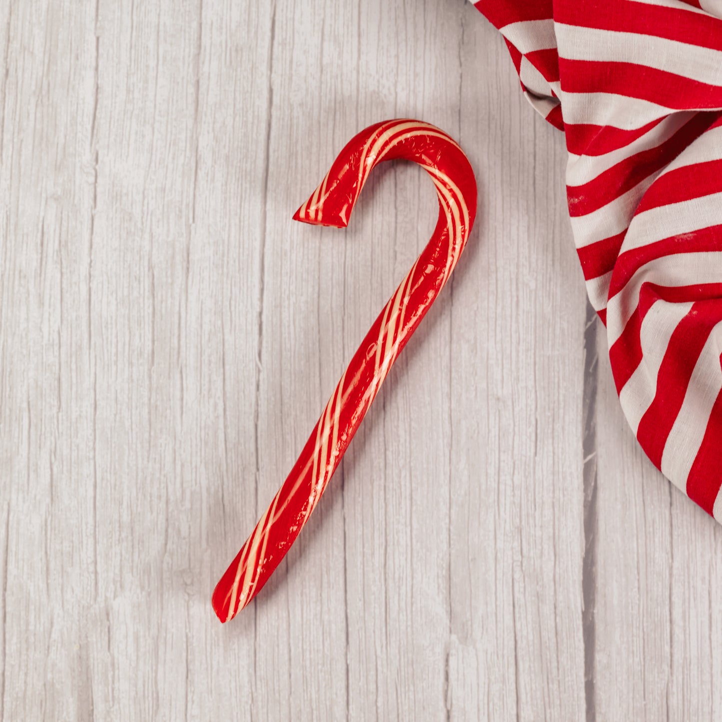 a large peppermint candy cane filled with chocolate