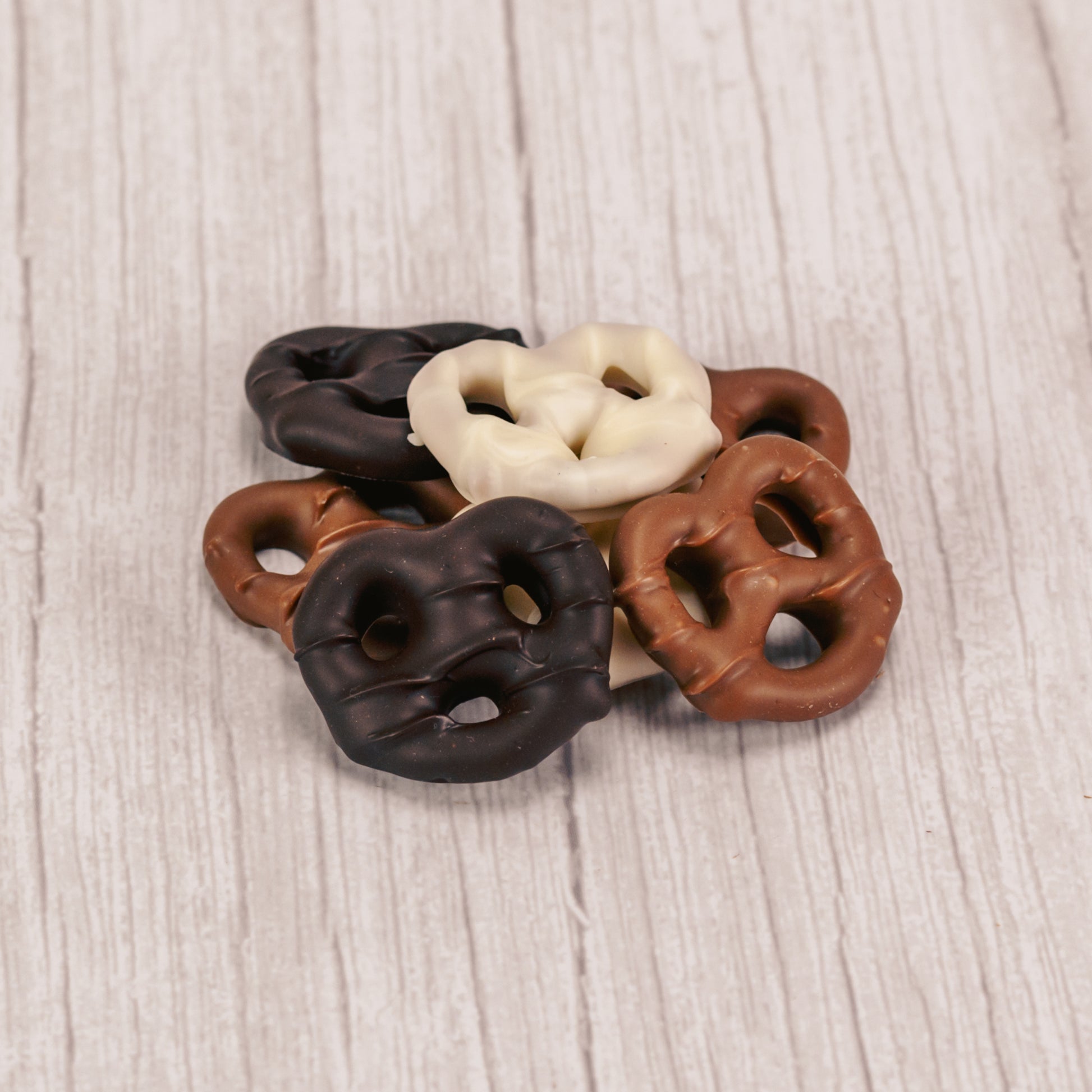 Pretzels dipped in smooth milk chocolate, rich dark chocolate or white coating. Half pound package.