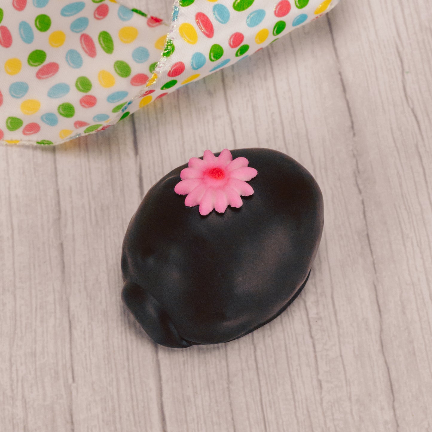 This egg has a rich fudgy chocolate center and is covered in milk or dark chocolate. Assorted sugar and icing decorations, choose a quarter pound, half pound or one pound egg.